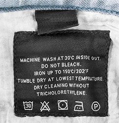 Clothing tag with care instructions and washing care symbols